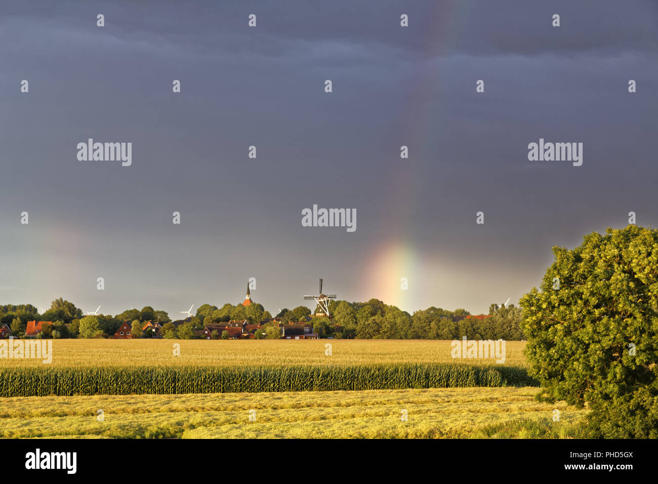 Rainbow in the evening sky Stock Photo