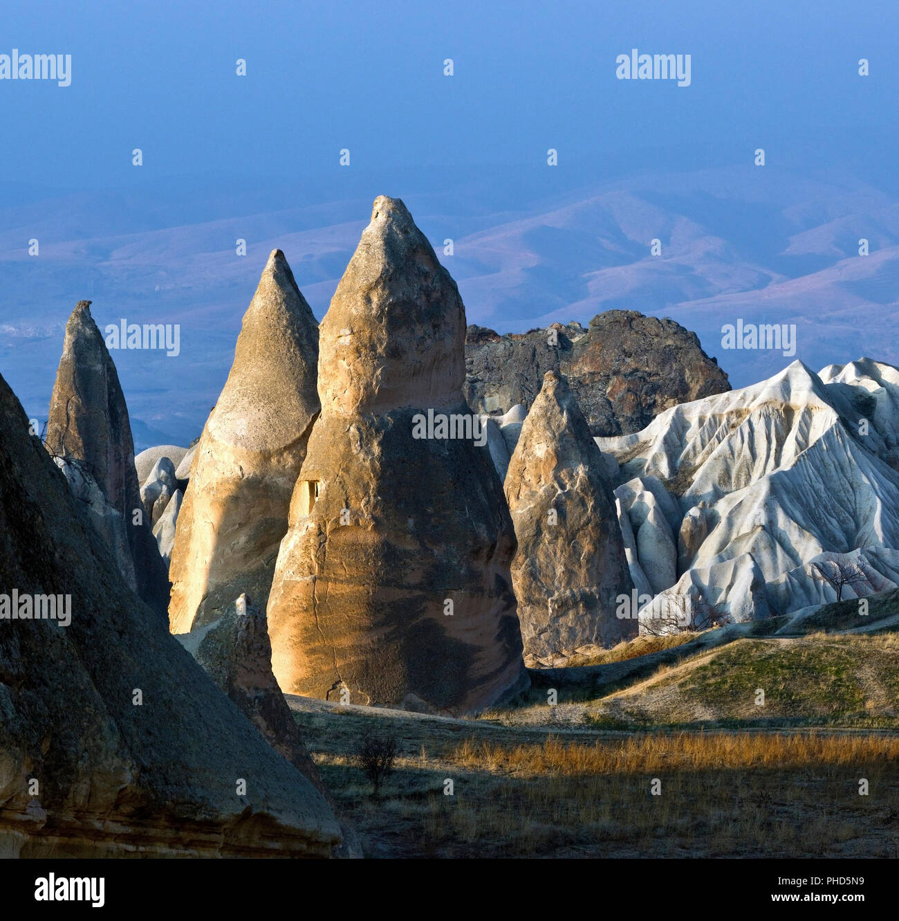 Rock formations known as fairy chimneys in the Rose Valley, Cappadocia, Turkey Stock Photo