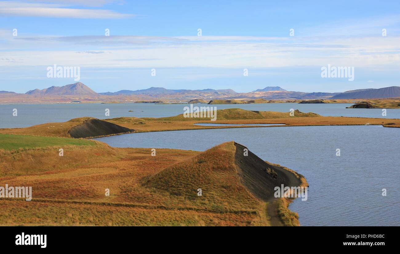 Lake Myvatn and volcanic landscape. Late summer day in Iceland. Stock Photo
