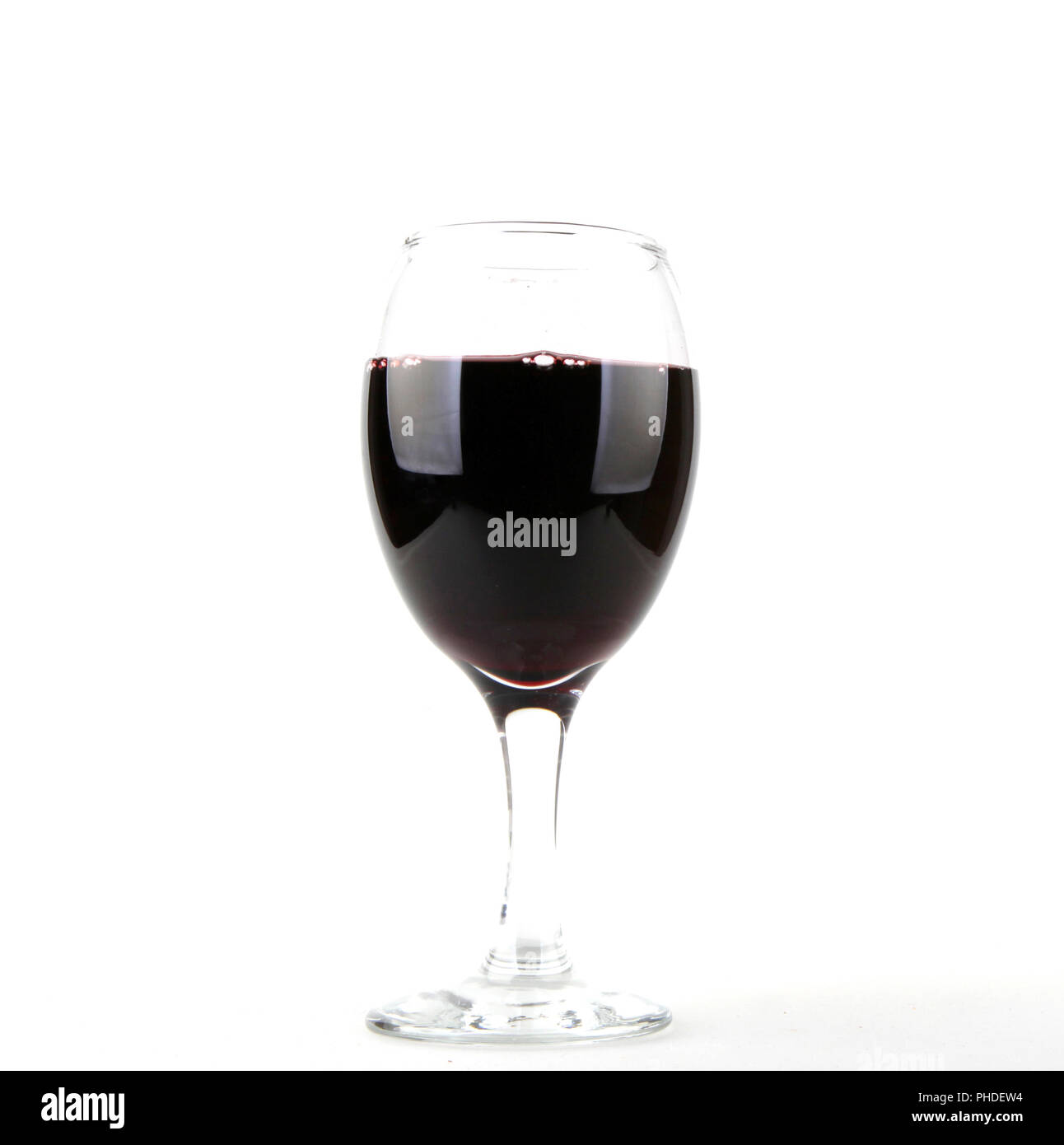 Glass of red wine isolated on white background Stock Photo - Alamy