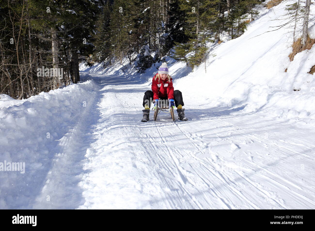 Kid sledging hi-res stock photography and images - Alamy