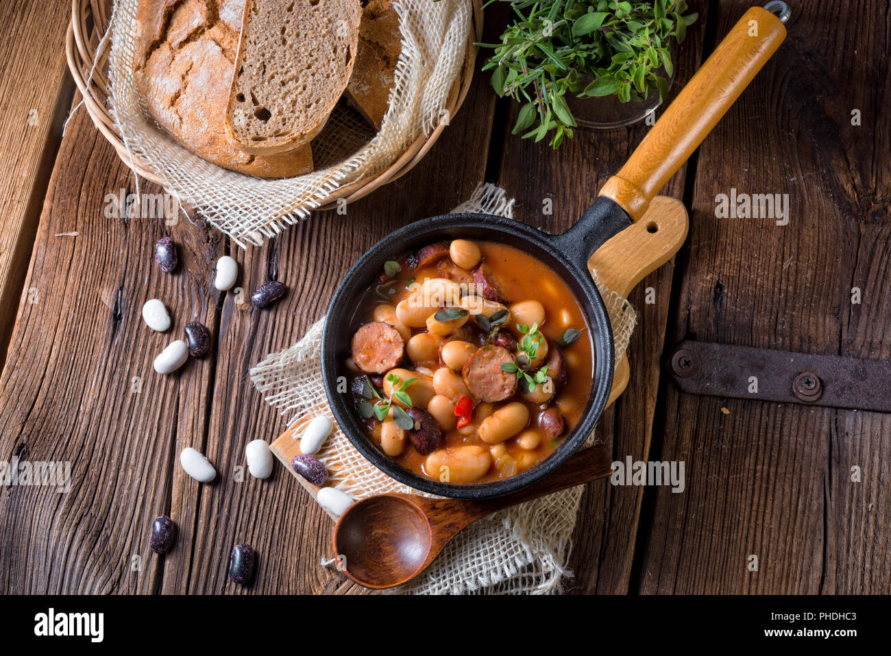 Polish Baked Beans with sausage Stock Photo Alamy