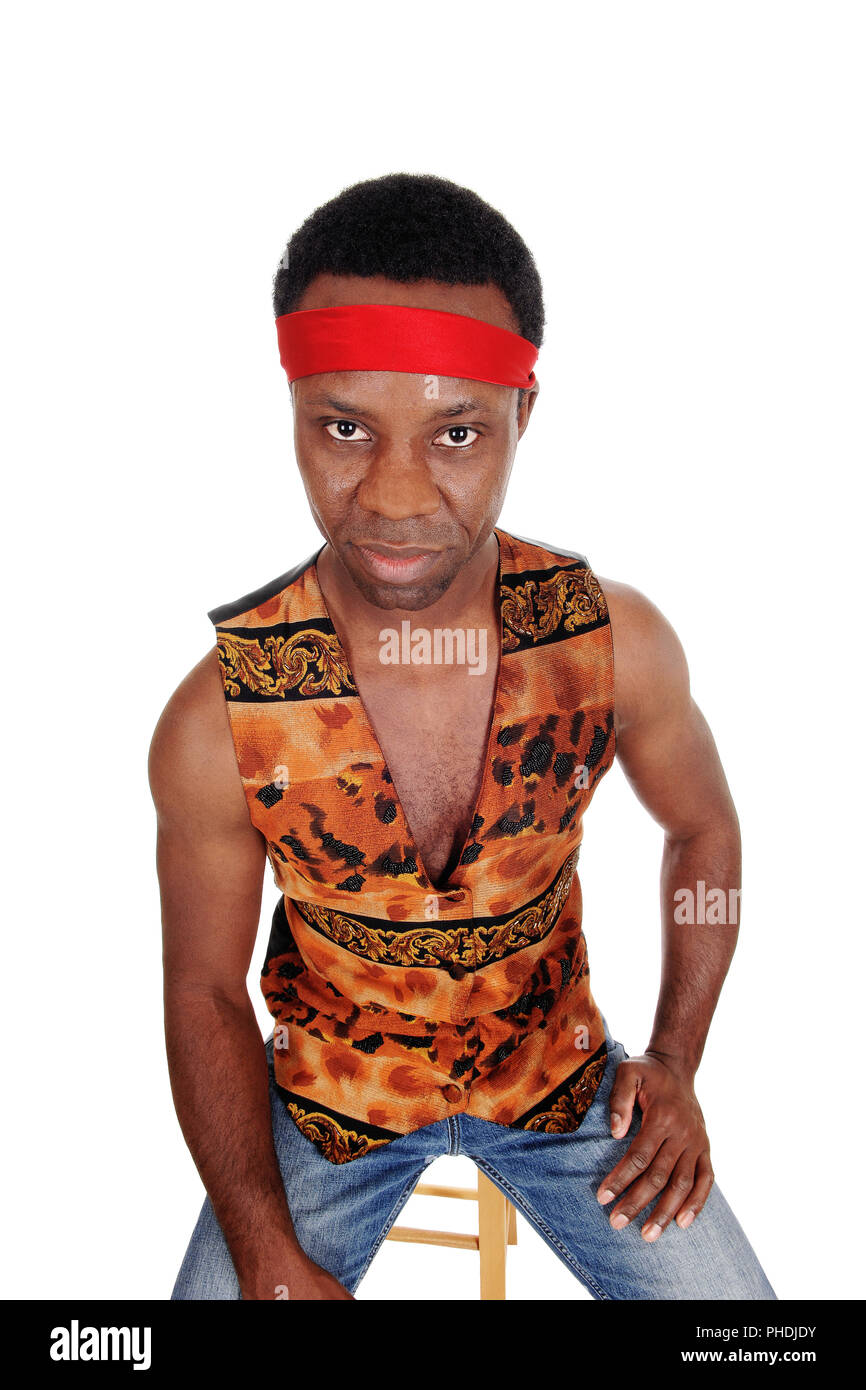 Serious looking African man in a vest Stock Photo