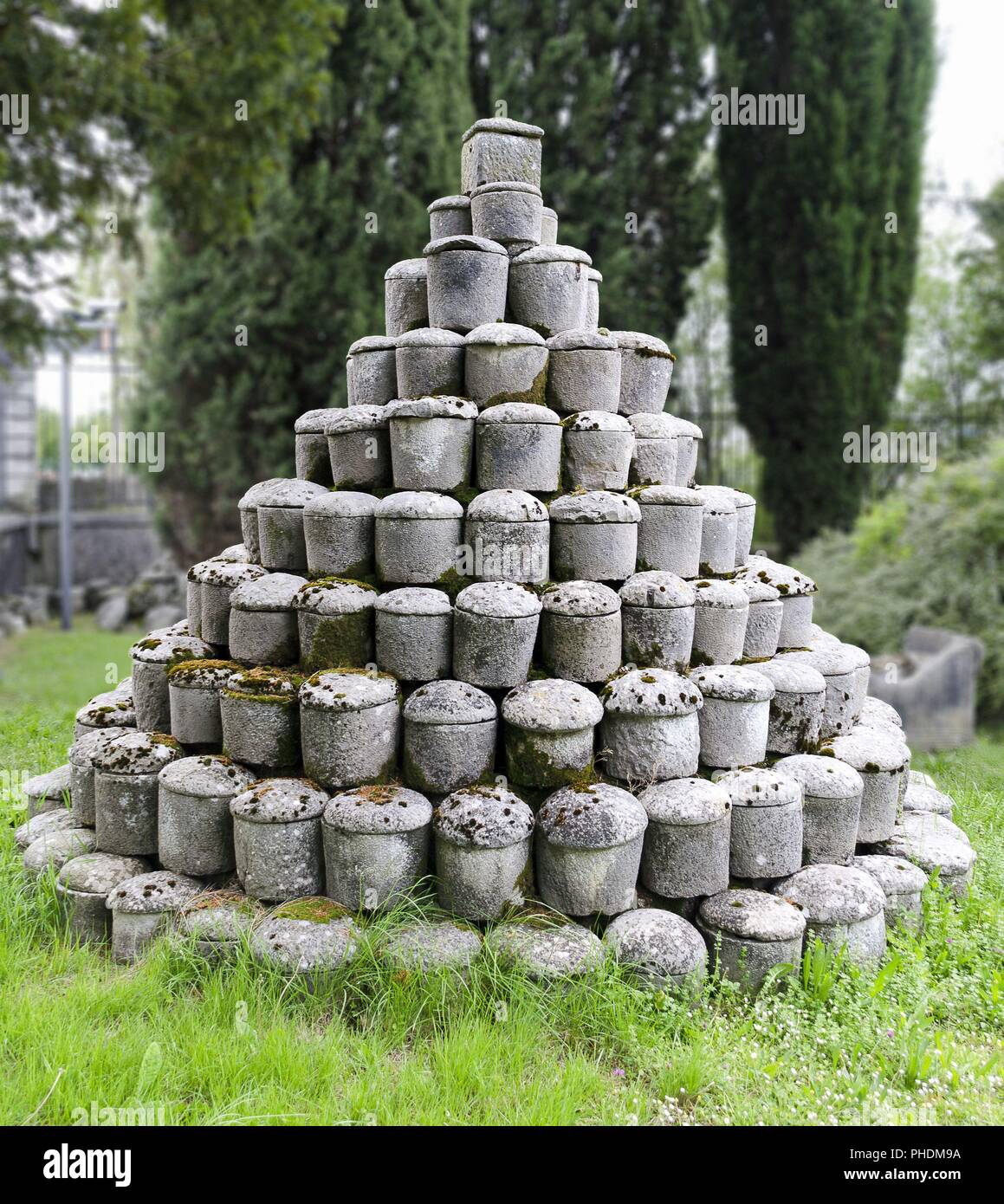 piled up roman stone urns Stock Photo