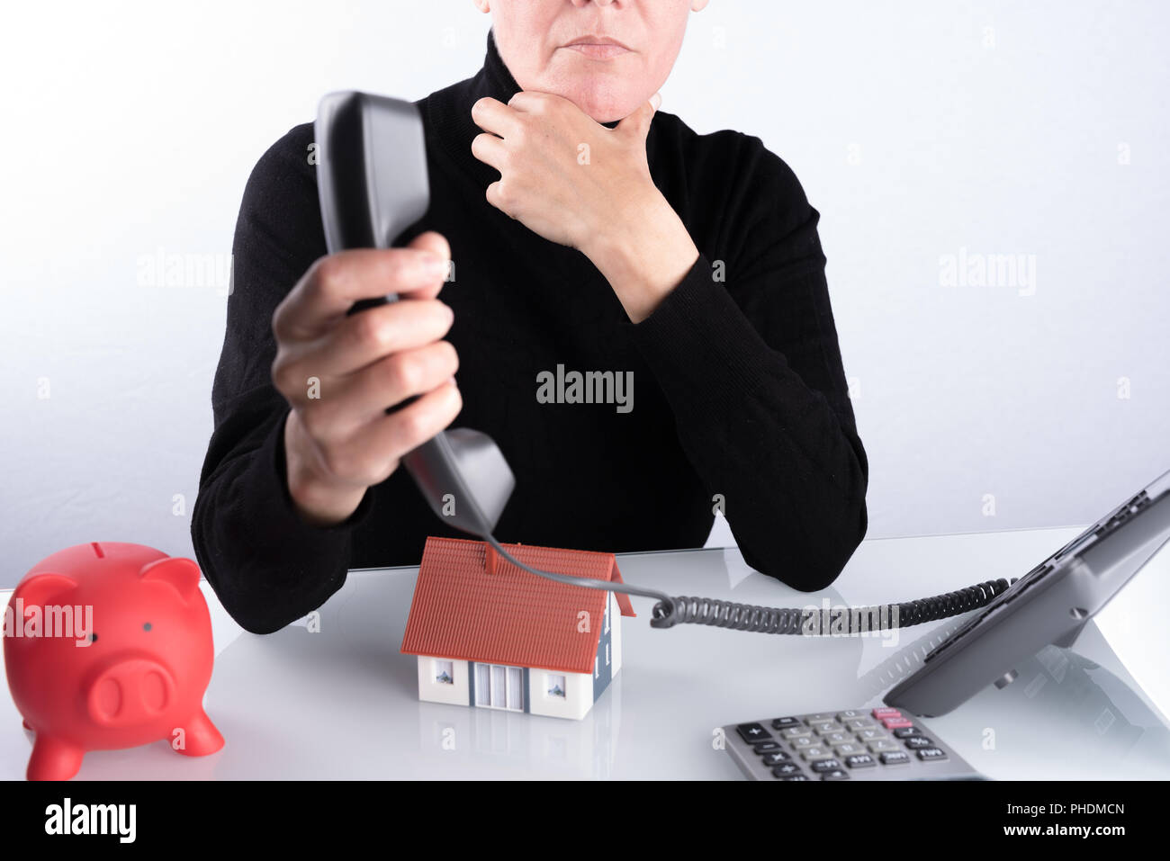 Real estate agent at the desk Stock Photo Alamy
