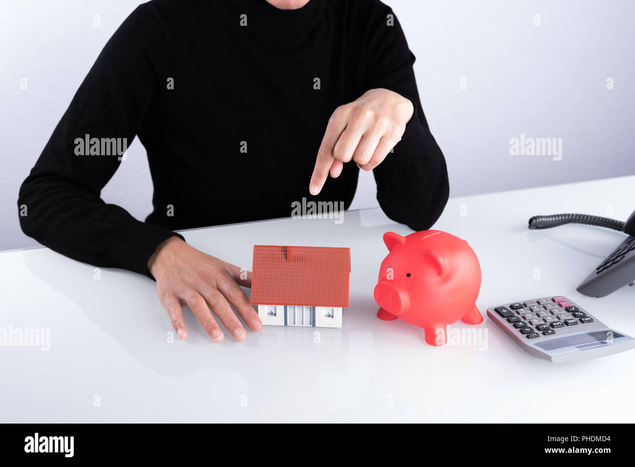 Real estate agent at the desk Stock Photo Alamy