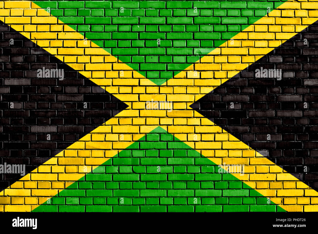 flag of Jamaica painted on brick wall Stock Photo