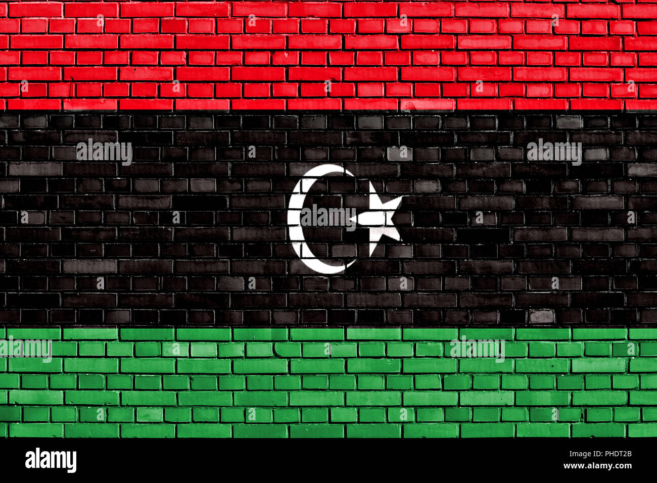 flag of Libya painted on brick wall Stock Photo