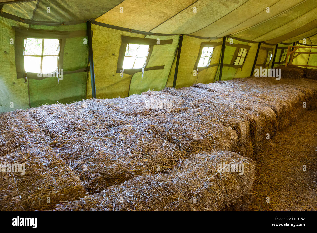 Inside of big military tent Stock Photo - Alamy