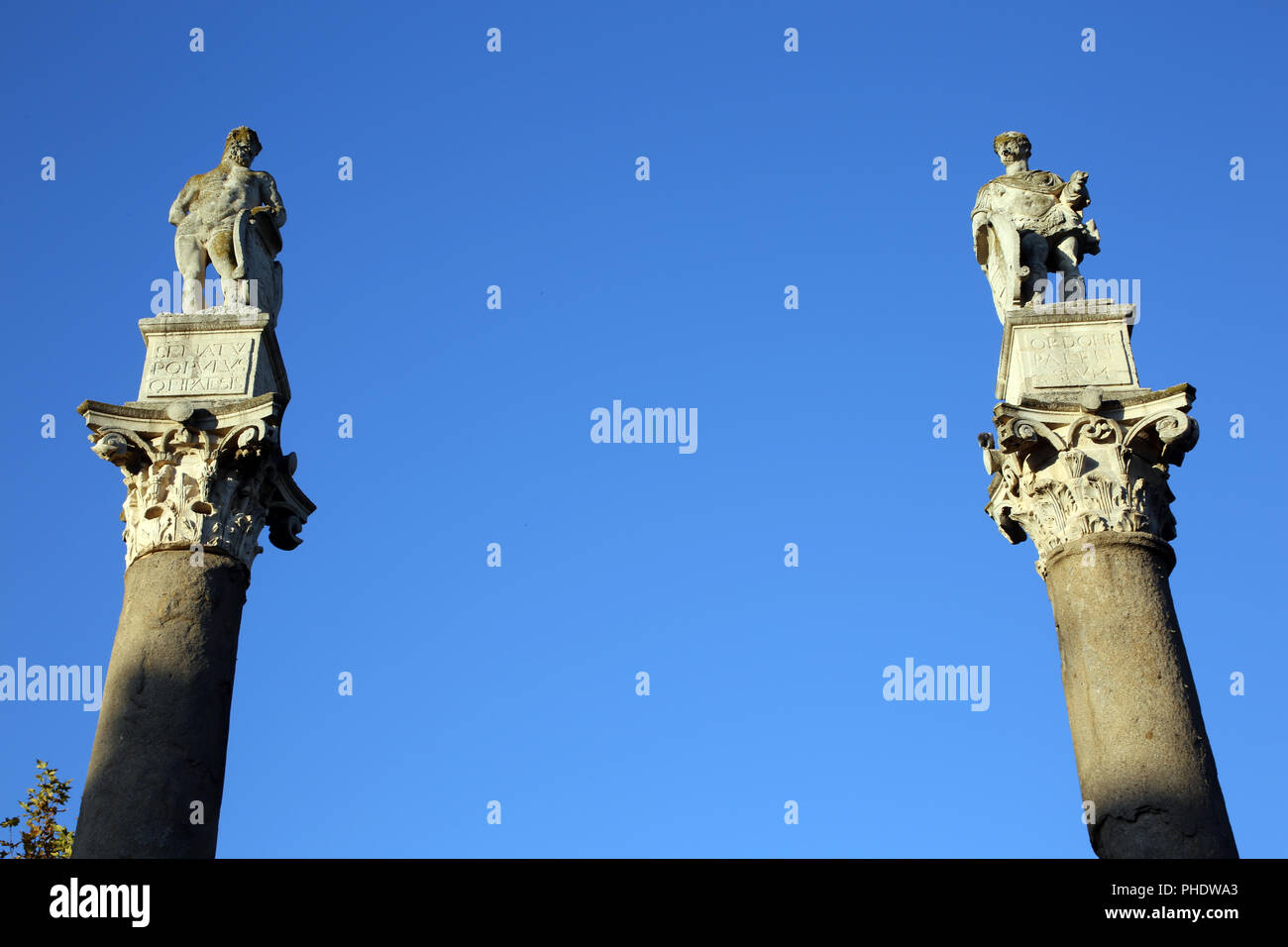 two pillars on Alameda de Hercules square Stock Photo