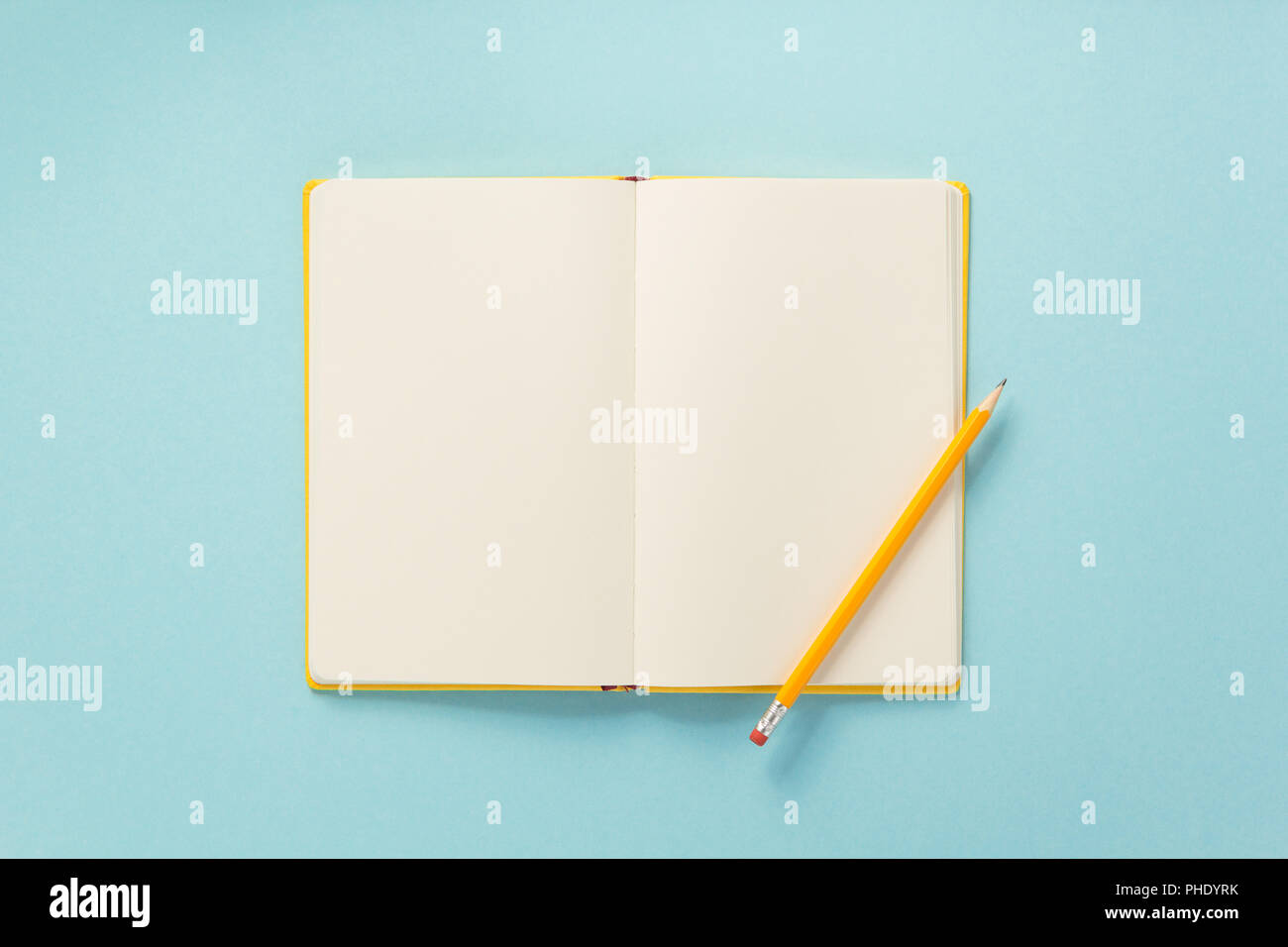 notebook and school accessories at abstract background surface Stock Photo