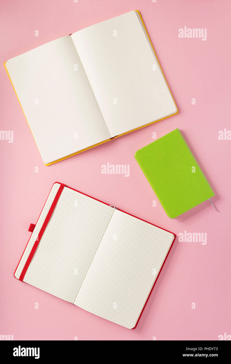 notebook and school accessories at abstract background surface Stock Photo