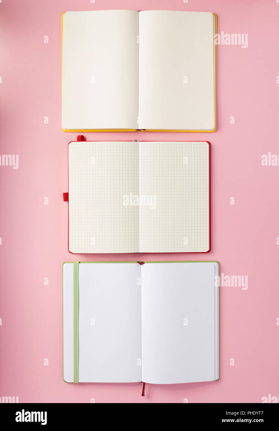 notebook and school accessories at abstract background surface Stock Photo