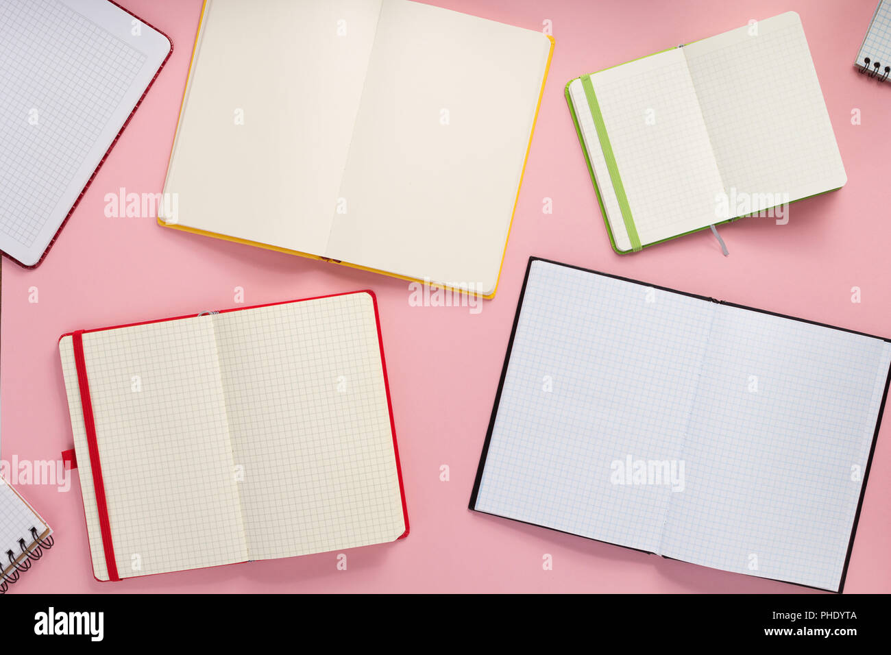 notebook and school accessories at abstract background surface Stock Photo