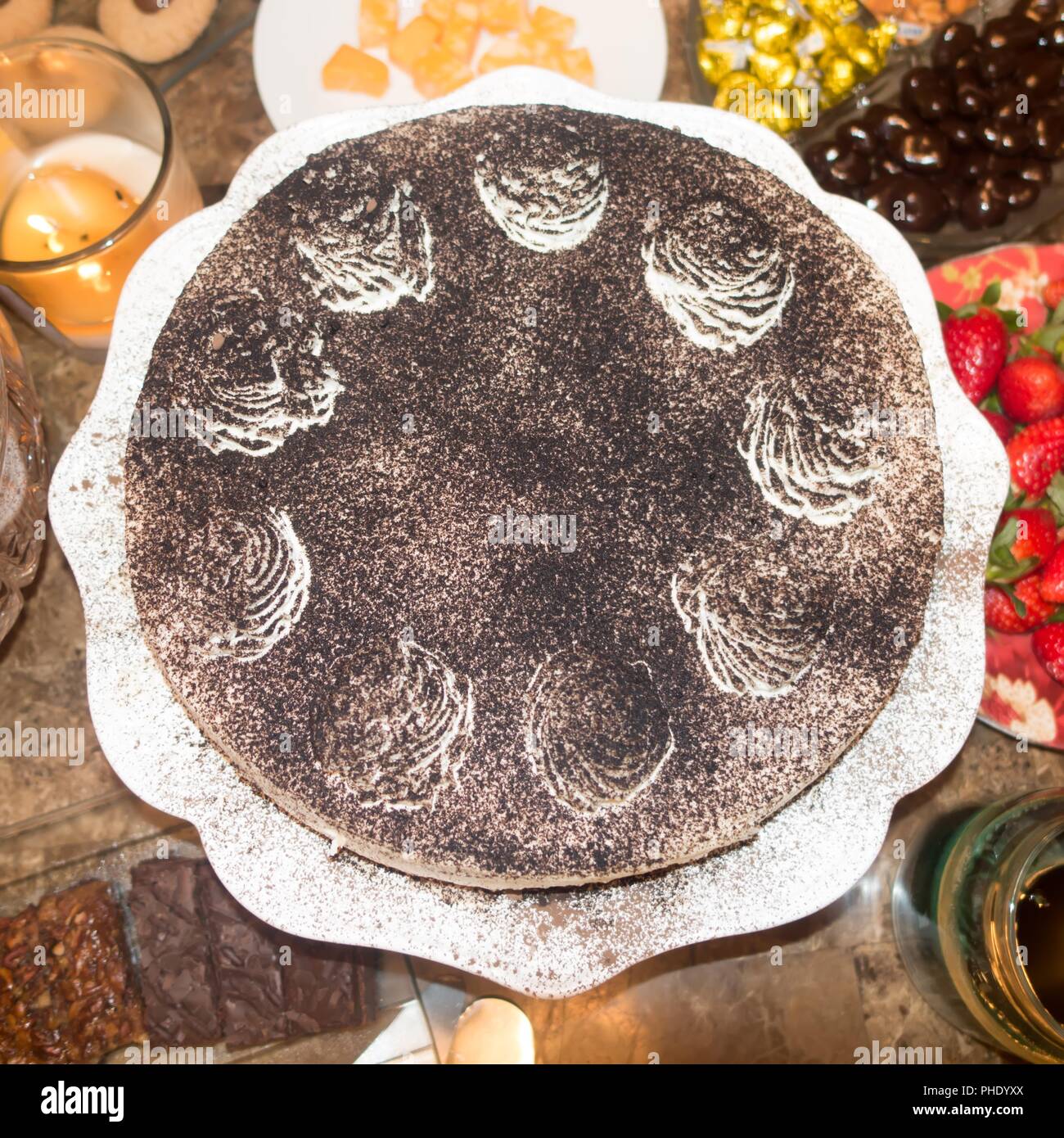 chocolate coffee tiramisu cake on dinner table for a birthday Stock