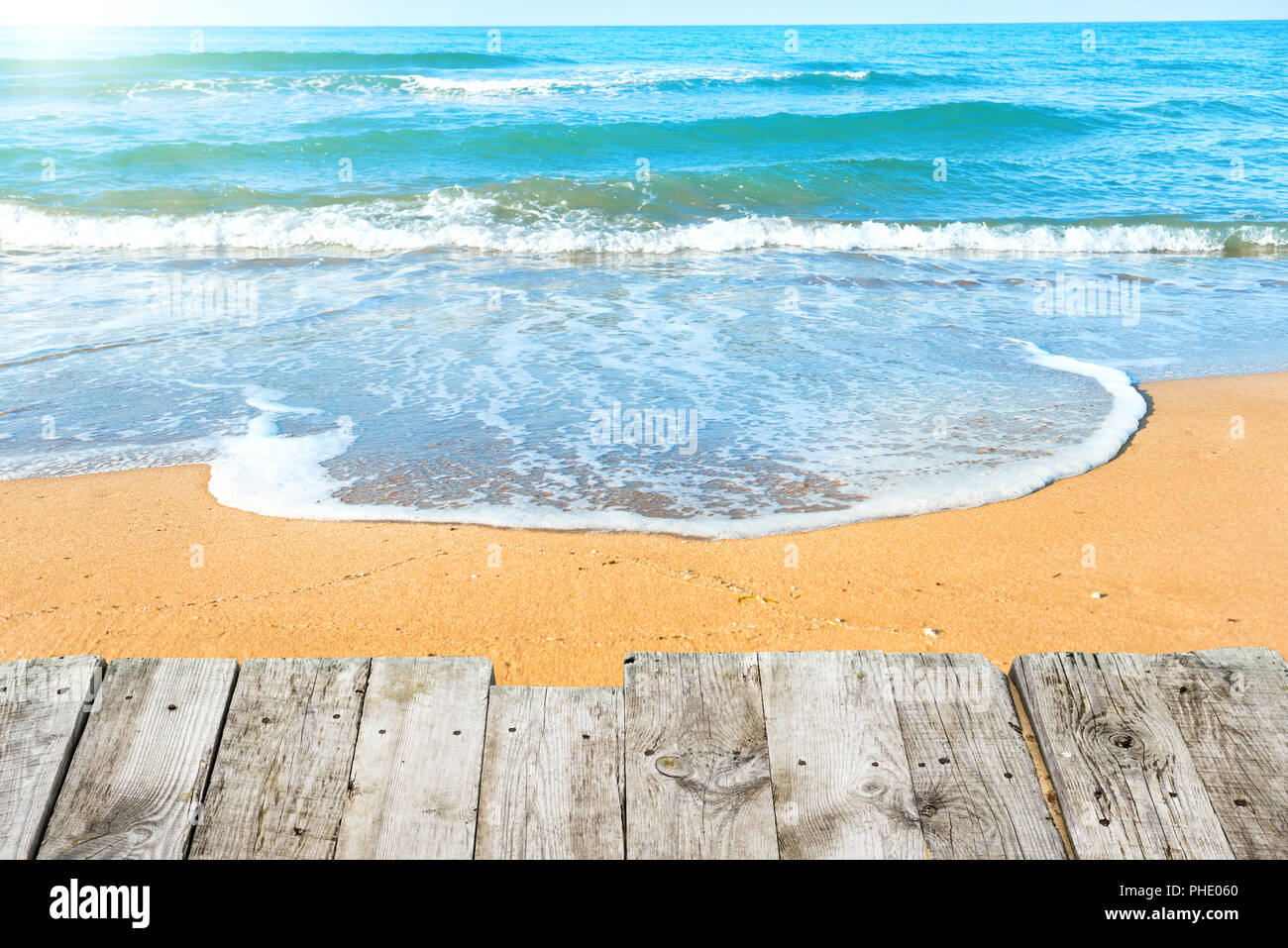 View from wooden desk on tropical beach Stock Photo Alamy
