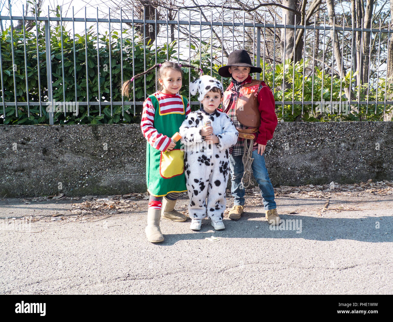 children dressed in carnival costumes on the outside Stock Photo
