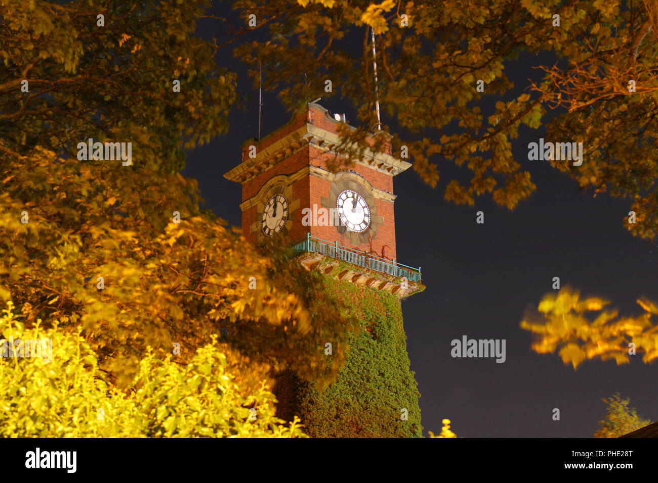Seacroft hospital clock tower at night hires stock photography and