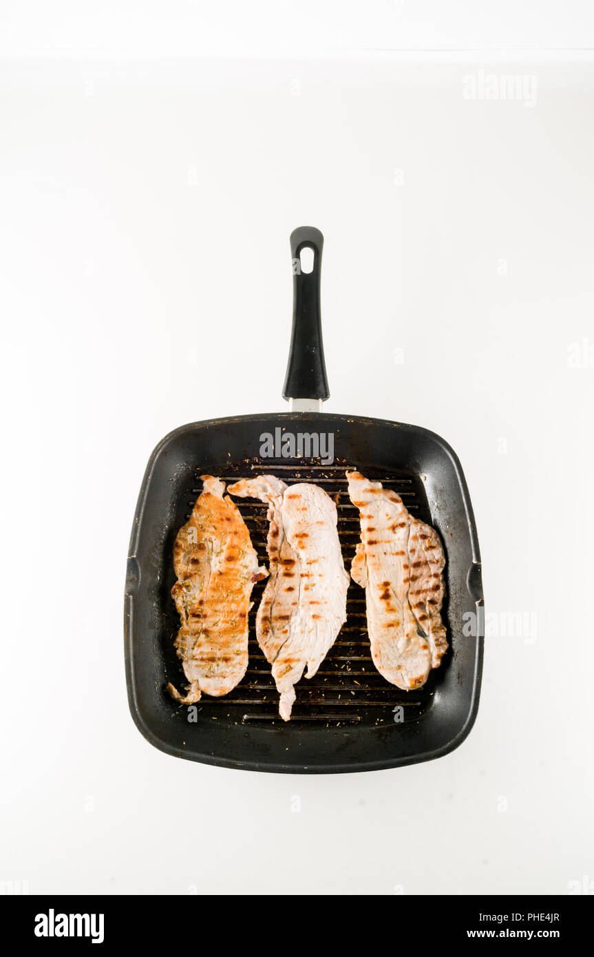 meat in a pan fry Stock Photo Alamy