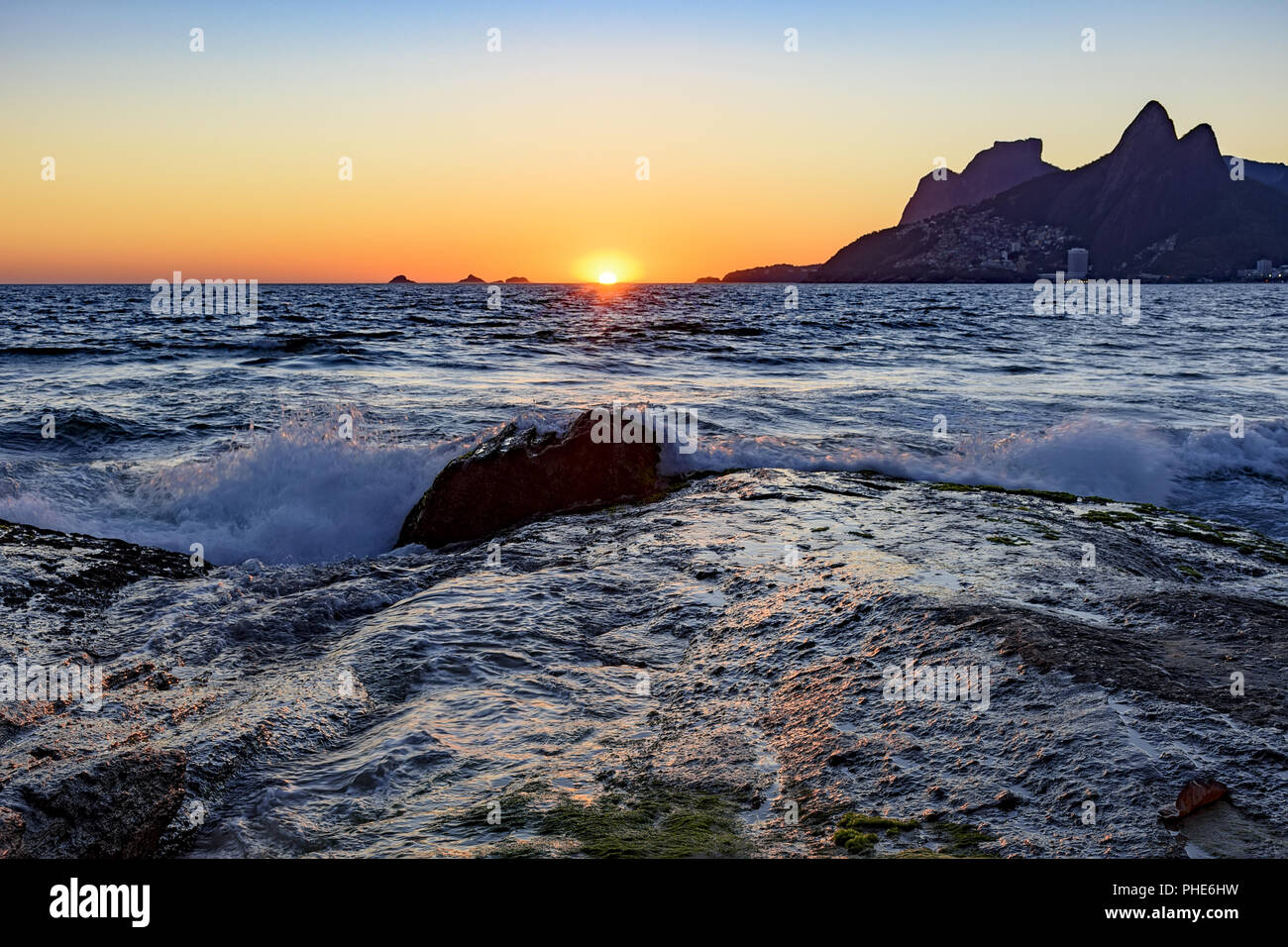 Night arriving at the Arpoador stone, Ipanema beach Stock Photo - Alamy