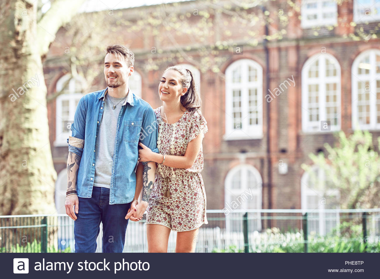 Teen Couple Walking Holding Hands High Resolution Stock Photography and ...