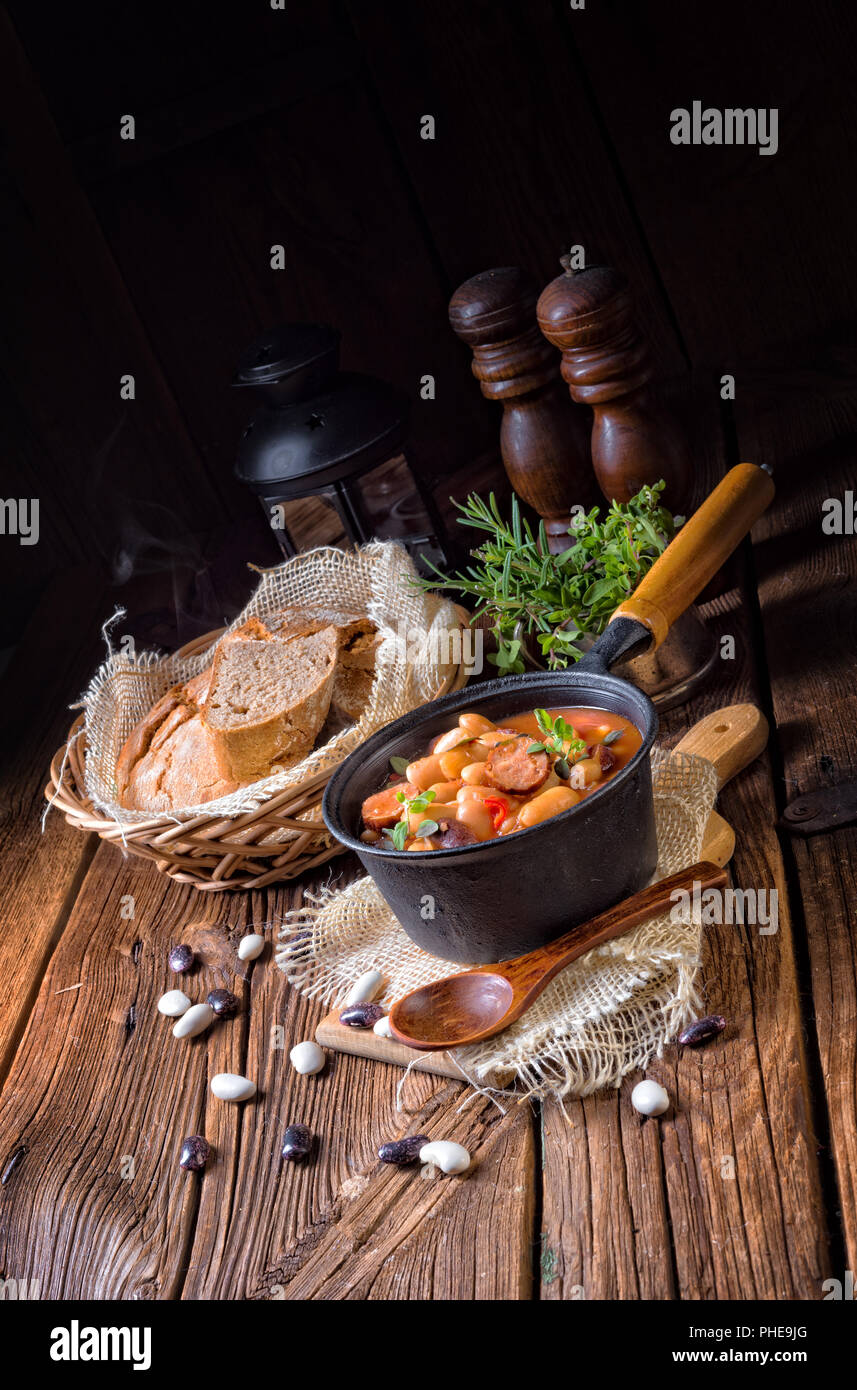 Polish Baked Beans with sausage Stock Photo Alamy