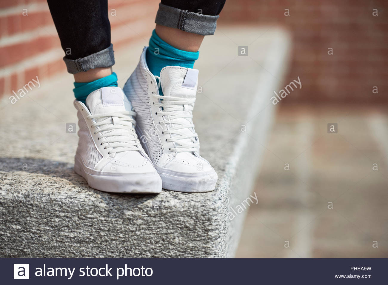Girl Wearing Sneakers High Resolution Stock Photography And Images Alamy