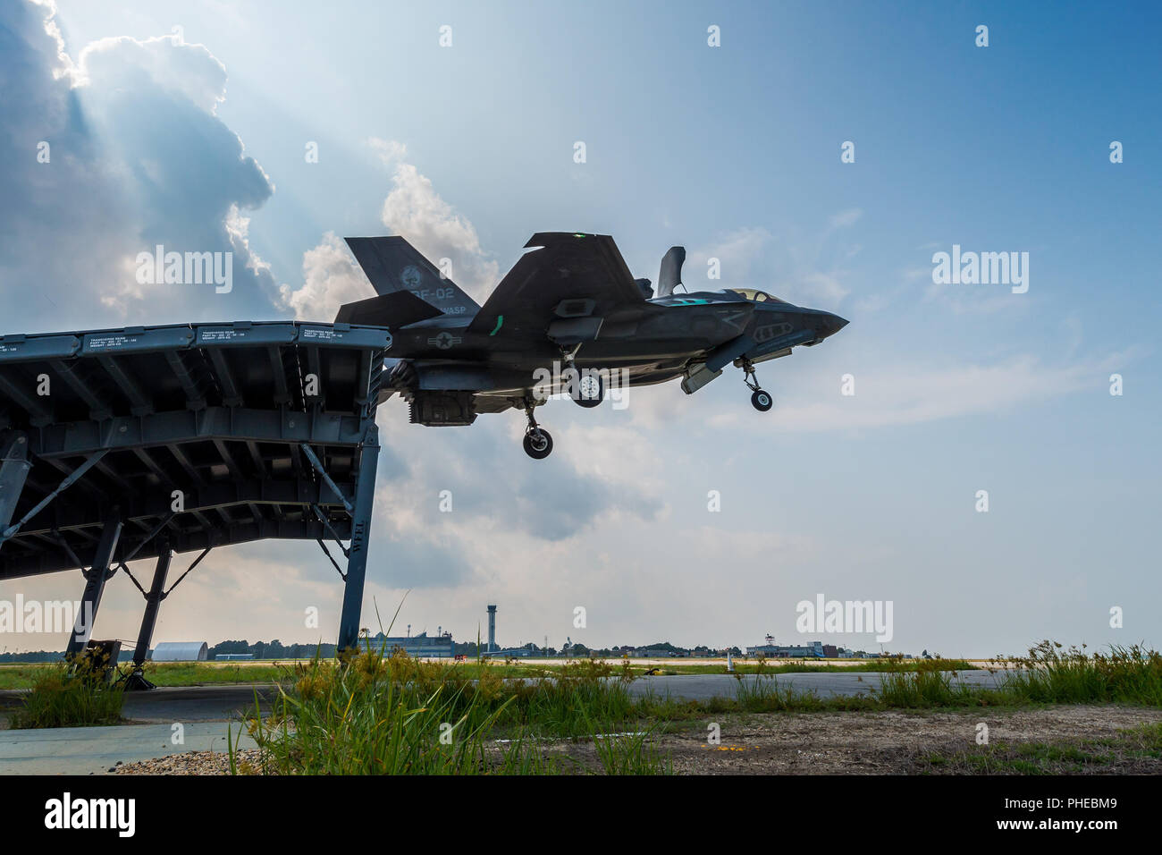 U.S. Marine Corps Maj. Michael Lippert and Royal Air Force Sq. Ldr. Andy Edgell, both F-35 Pax River ITF test pilots, conduct ski jumps and field carrier landing practices with F-35Bs on Aug. 27, 2018, at NAS Patuxent River as part of the workups for the First of Class Flight Trials aboard the HMS Queen Elizabeth.  Around 200 supporting staff from the ITF, including pilots, engineers, maintainers and data analysts, will take two F-35Bs test aircraft aboard HMS Queen Elizabeth this fall to evaluate the fifth-generation aircraft performance and integration with Royal Navy’s newest aircraft carri Stock Photo