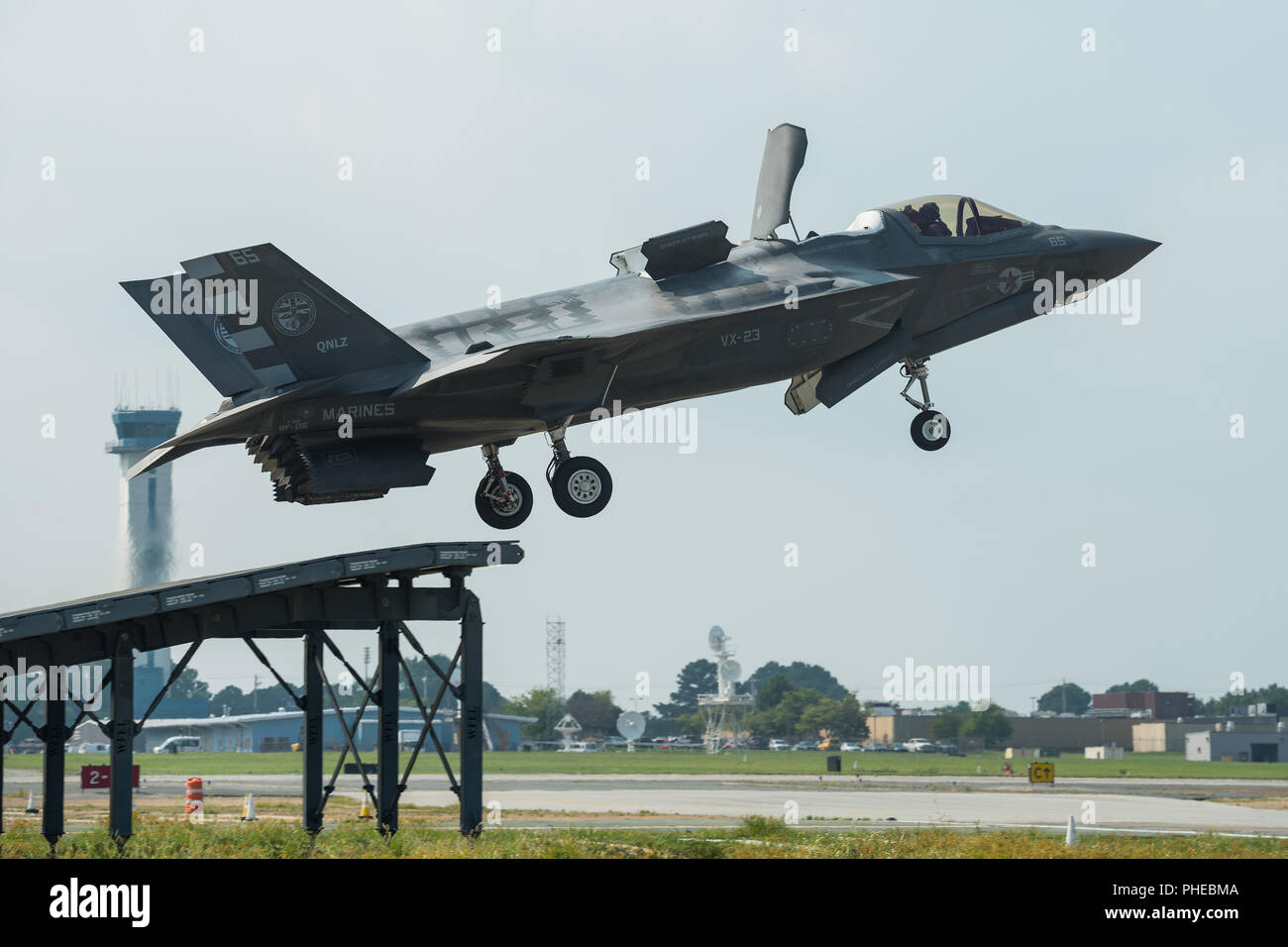 U.S. Marine Corps Maj. Michael Lippert and Royal Air Force Sq. Ldr. Andy Edgell, both F-35 Pax River ITF test pilots, conduct ski jumps and field carrier landing practices with F-35Bs on Aug. 27, 2018, at NAS Patuxent River as part of the workups for the First of Class Flight Trials aboard the HMS Queen Elizabeth.  Around 200 supporting staff from the ITF, including pilots, engineers, maintainers and data analysts, will take two F-35Bs test aircraft aboard HMS Queen Elizabeth this fall to evaluate the fifth-generation aircraft performance and integration with Royal Navy’s newest aircraft carri Stock Photo