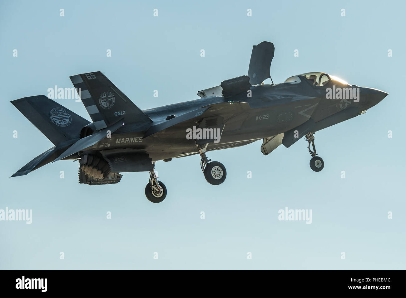 Royal Navy Cmdr. Nathan Gray, F-35 Pax River ITF test pilot, conducts short take offs and vertical landings with an F-35B on Aug. 23, 2018, at NAS Patuxent River as part of the workups for the First of Class Flight Trials aboard the HMS Queen Elizabeth.  Around 200 supporting staff from the ITF, including pilots, engineers, maintainers and data analysts, will take two F-35Bs test aircraft aboard HMS Queen Elizabeth this fall to evaluate the fifth-generation aircraft performance and integration with Royal Navy’s newest aircraft carrier. This fixed wing test period brings the U.K. one step close Stock Photo