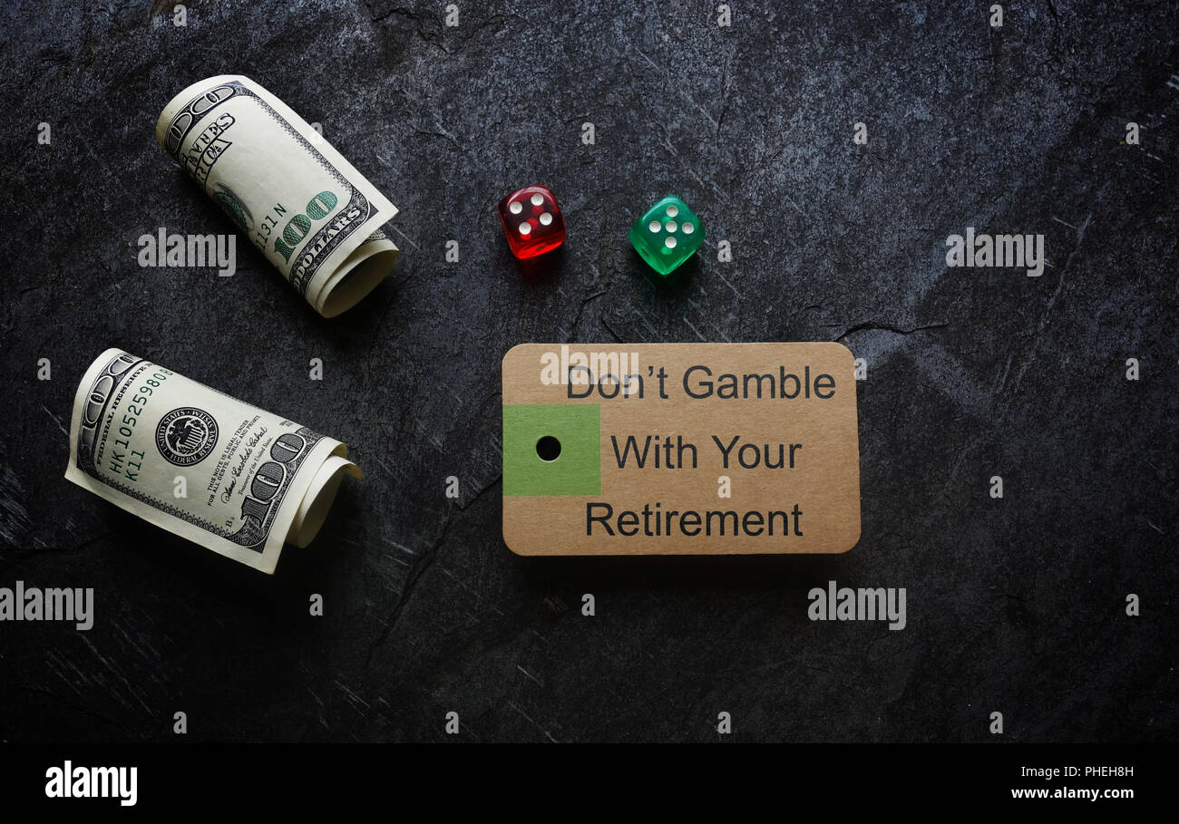 Gamble with retirement tag Stock Photo