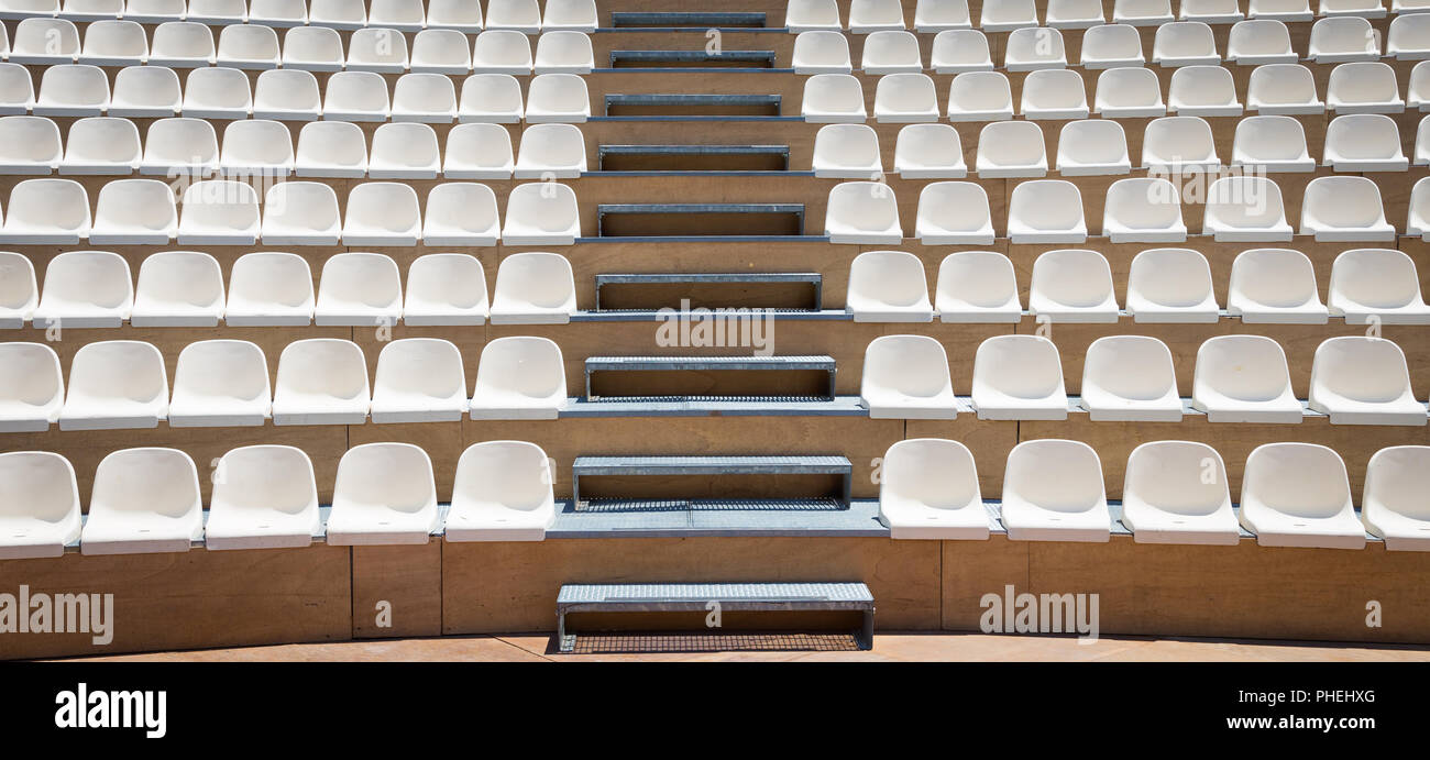 Rows of plastic seats Stock Photo - Alamy