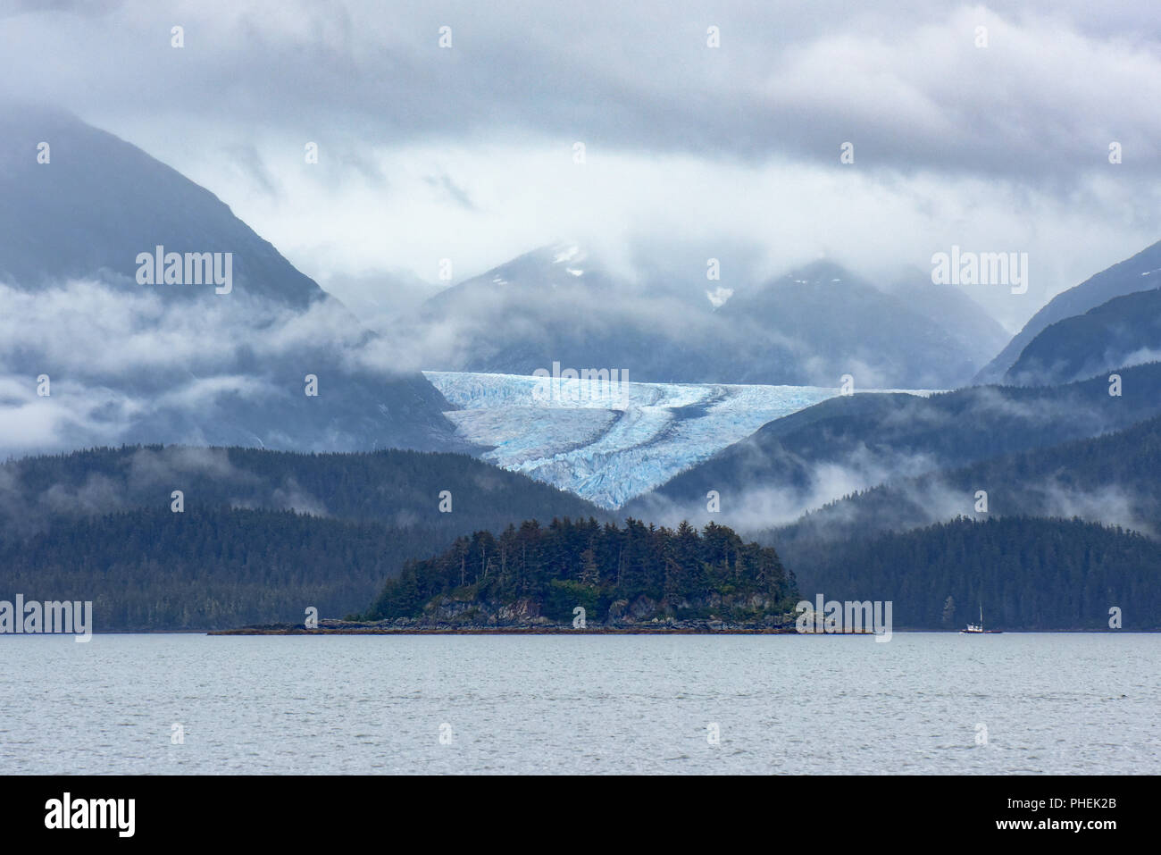 Herbert glacier in the distance from Lynn Canal outside of Juneau Alaska early morning cruise ship excursions and whale watching tour Stock Photo