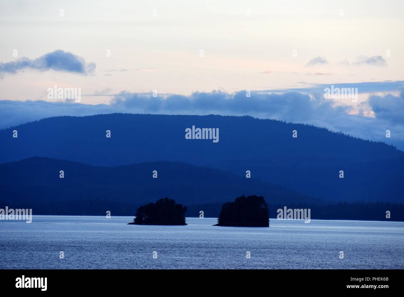 Sunrise on the Lynn Canal near Juneau Alaska - early morning pre-dawn cruise ship excursion and humpback whale watching tour Stock Photo