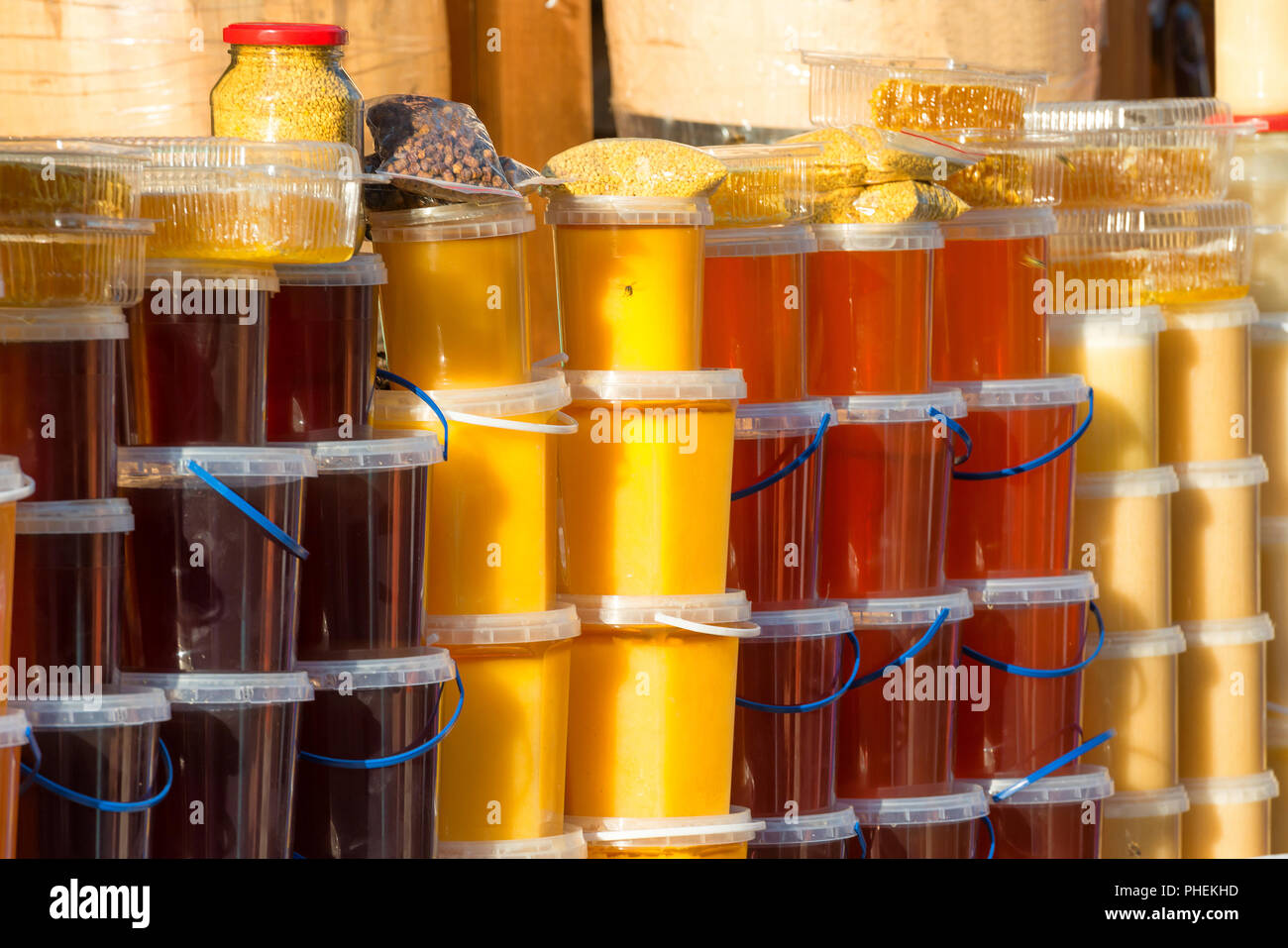 Many jars with honey Stock Photo Alamy