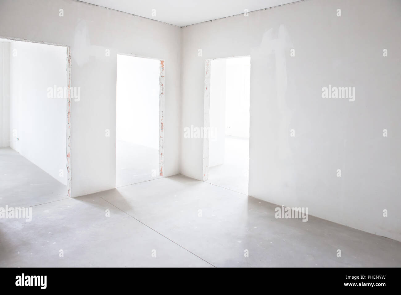 White room with tree entrances Stock Photo