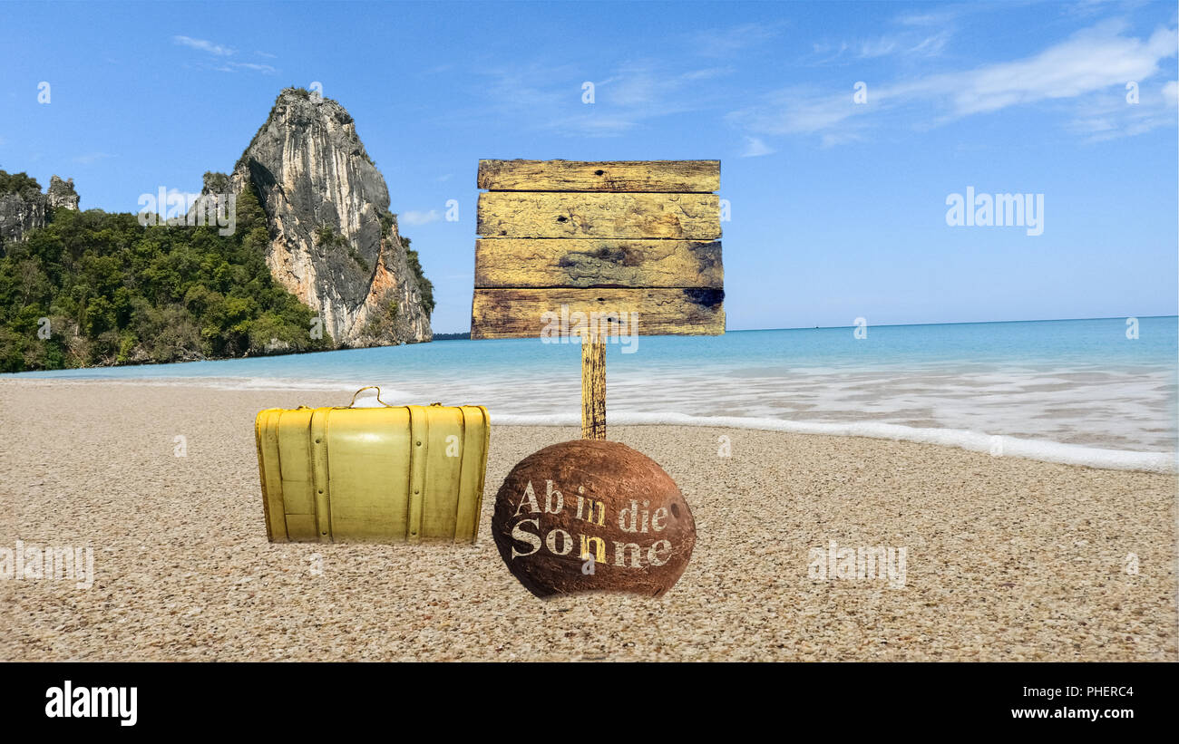 Wooden sign on the beach Stock Photo - Alamy