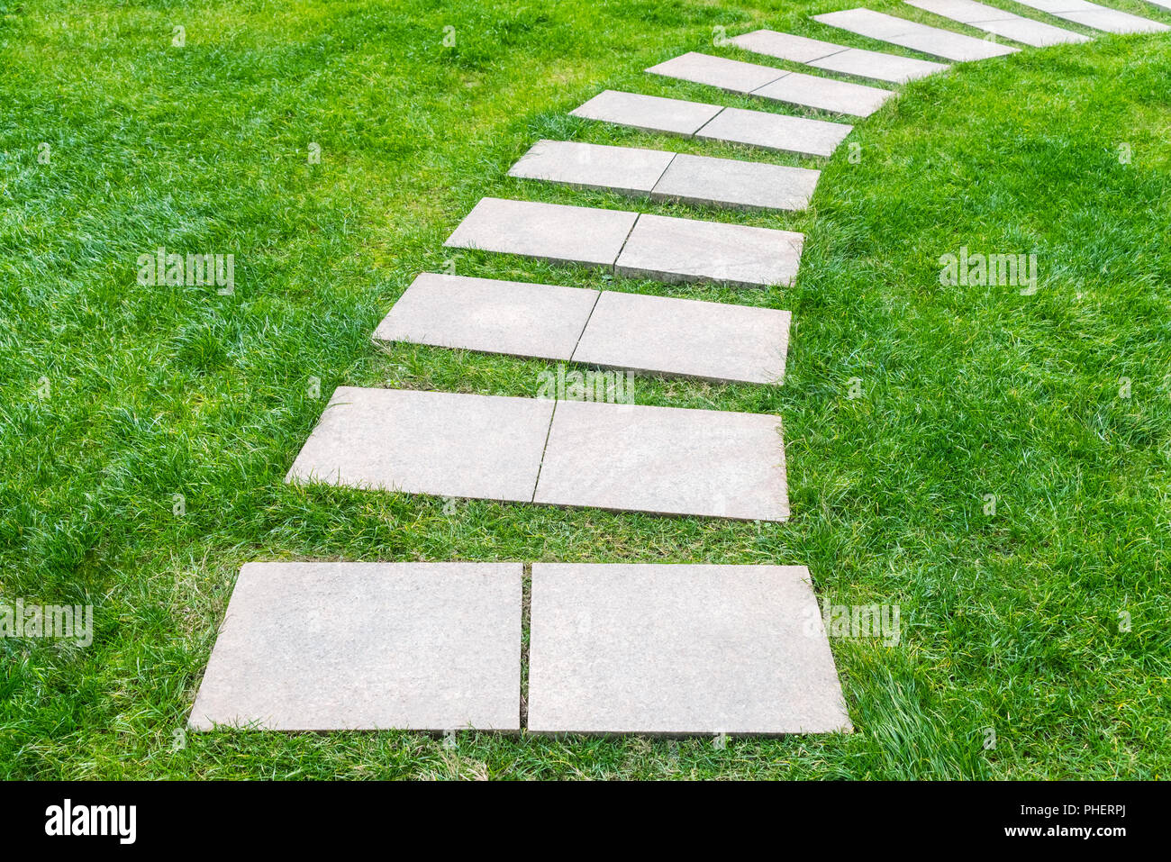 stone path on the lawn Stock Photo