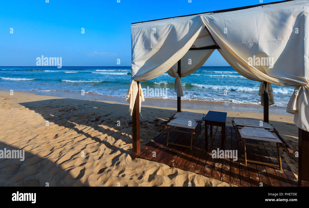 Beach canopies, Salento, Pescoluse, Italy Stock Photo