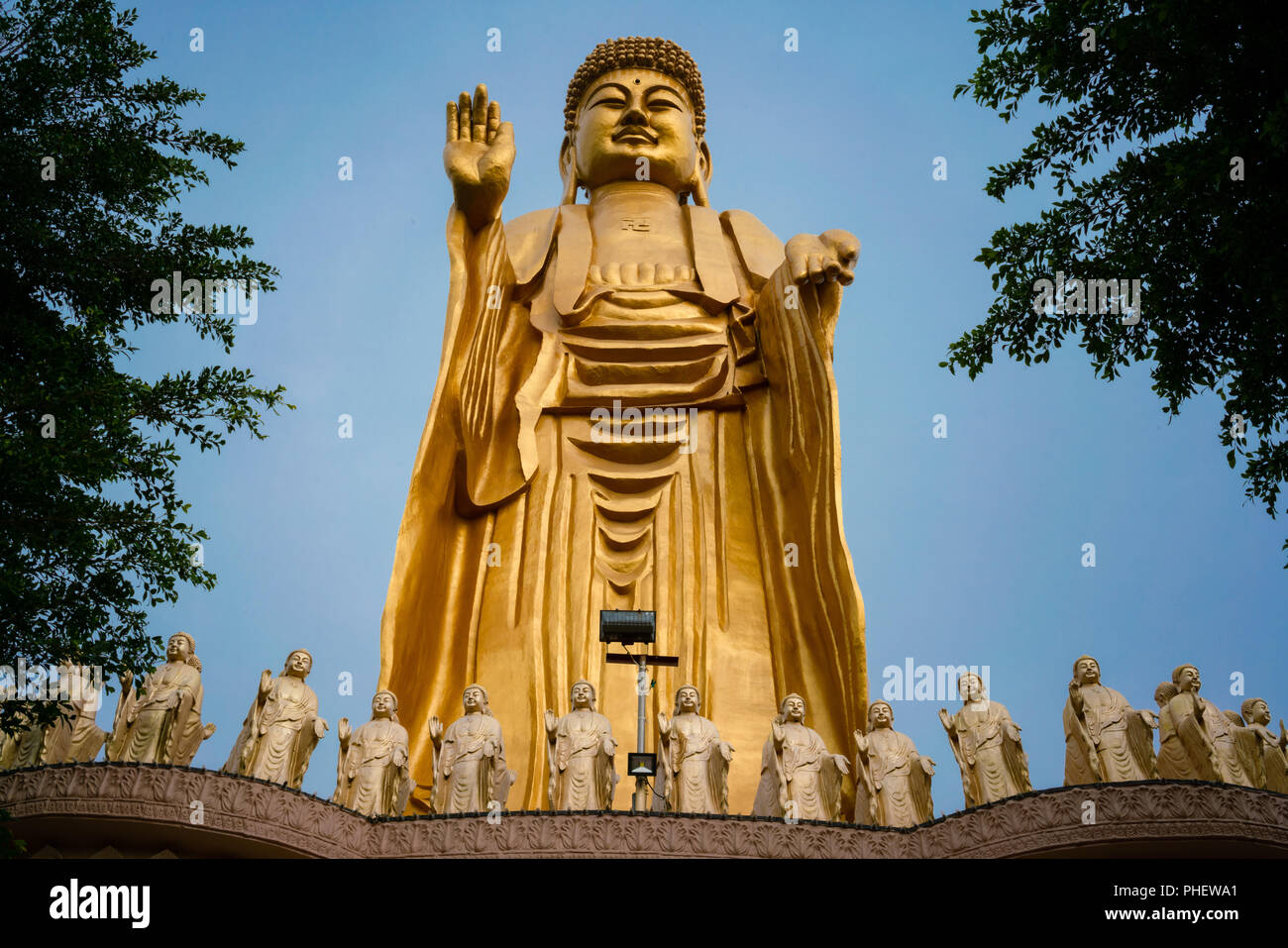 Great Buddha golden standing statue at Fo Guang Shan monastery in Kaohsiung Taiwan Stock Photo