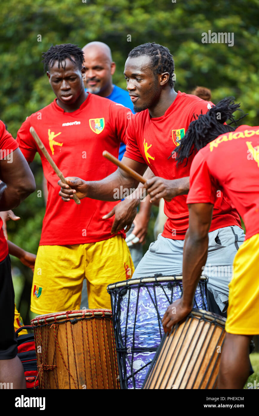 Montreal, Canada - June, 2018. African American male percussionists playing djembe and dunun drums at Tam Tams festival in Mount Royal Park, Montreal, Stock Photo