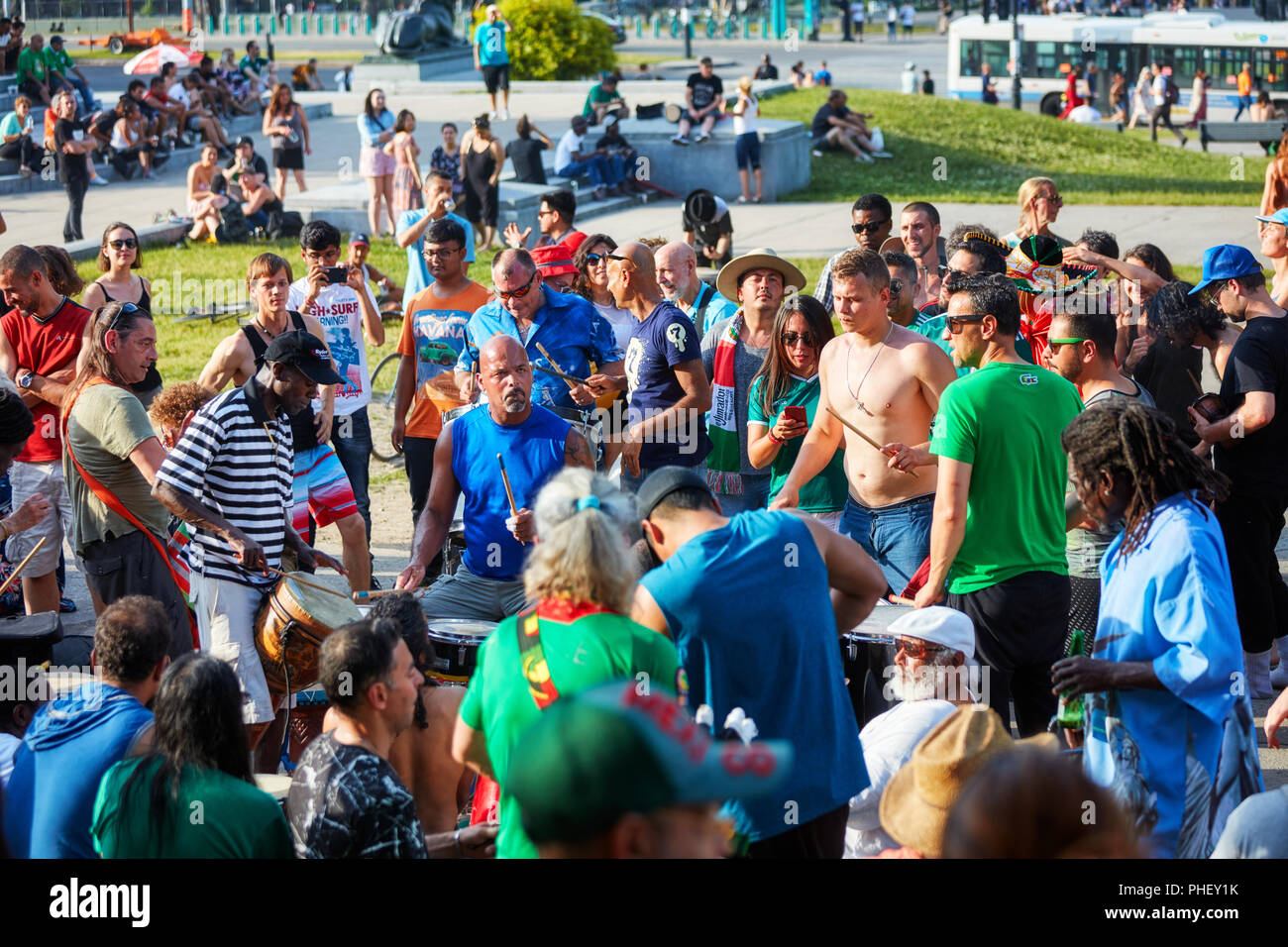 African American drummer and percussionists playing in front of the