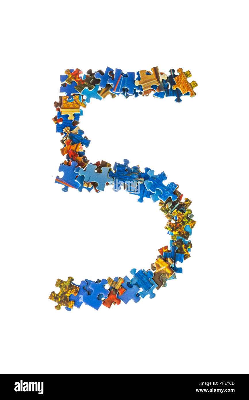 Number 5 made of puzzle pieces Stock Photo