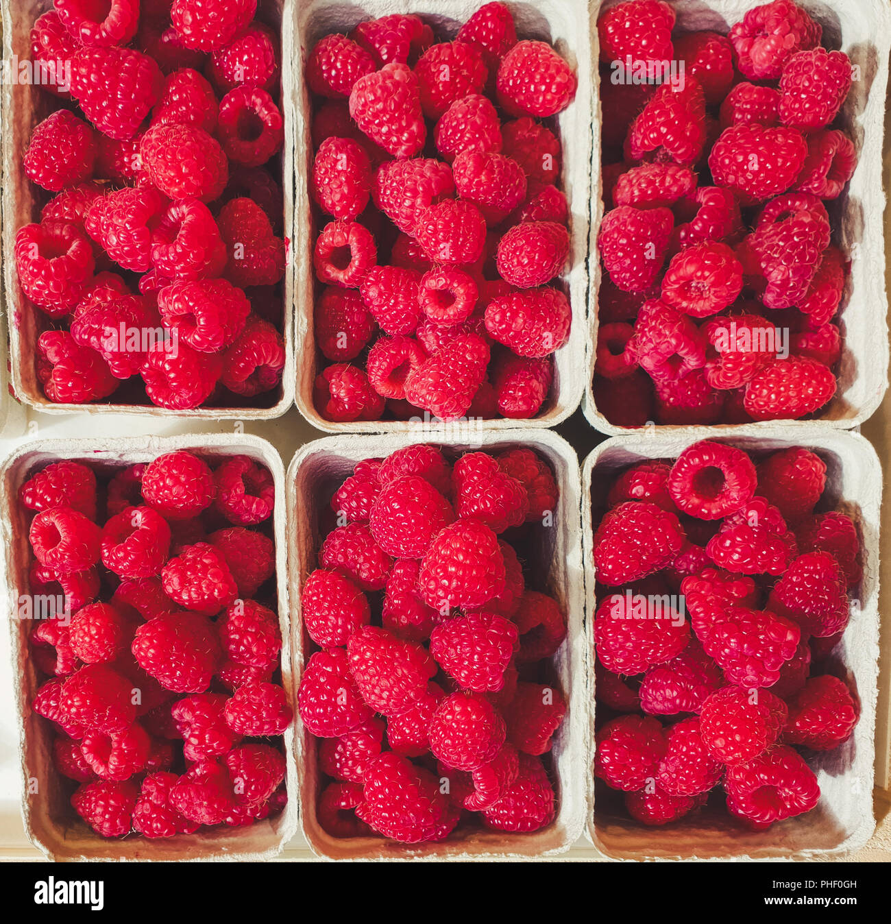 top down view on boxes of raspberries Stock Photo - Alamy