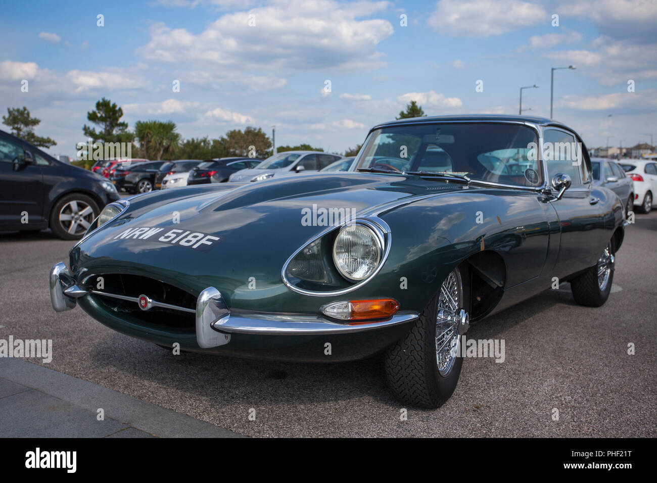 1968 60s Jaguar 'E' Type,  classic, veteran, old, historic, british motors; Type green at Morecambe, UK Stock Photo