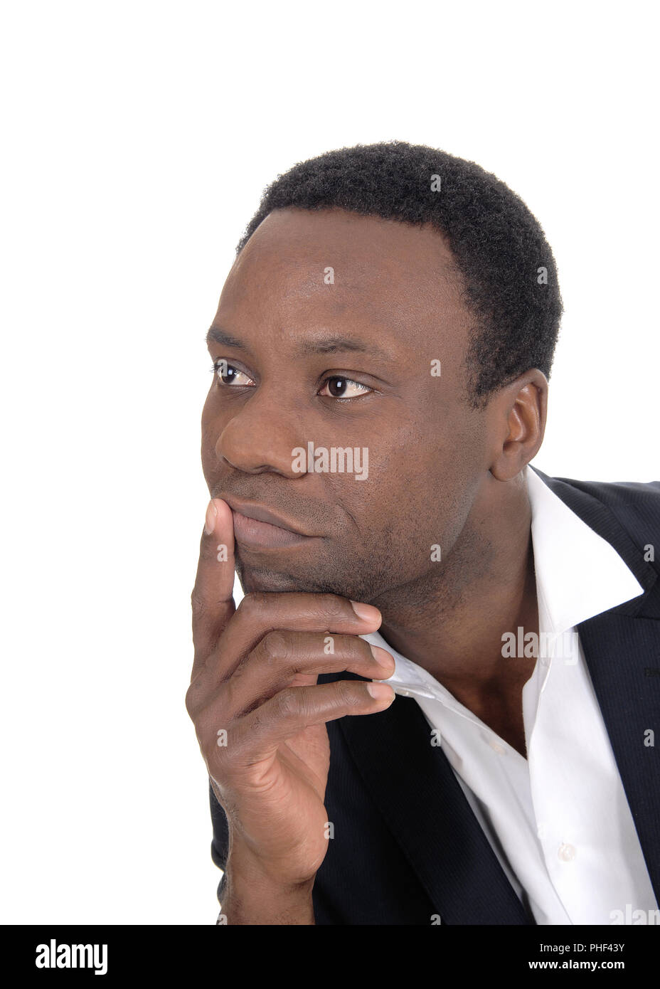 Portrait of African man with hand on chin Stock Photo