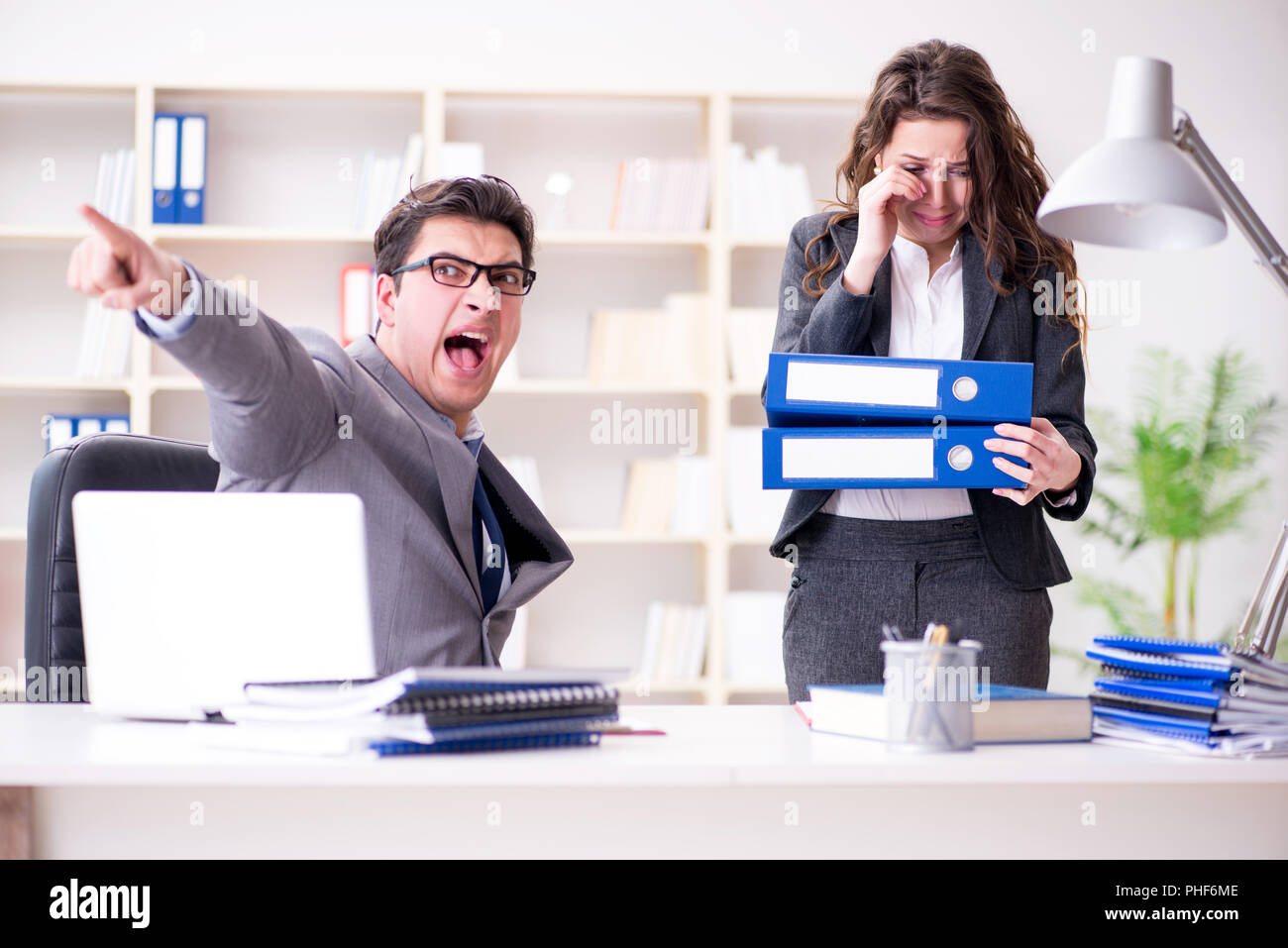 Angry boss unhappy with female employee performance Stock Photo Alamy