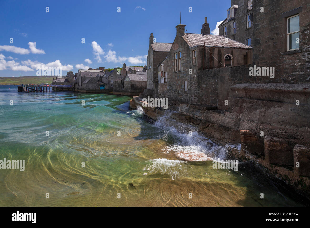Old stone houses by the sea at Lerwick, Shetland Isles, Scotland on a sunny day Stock Photo