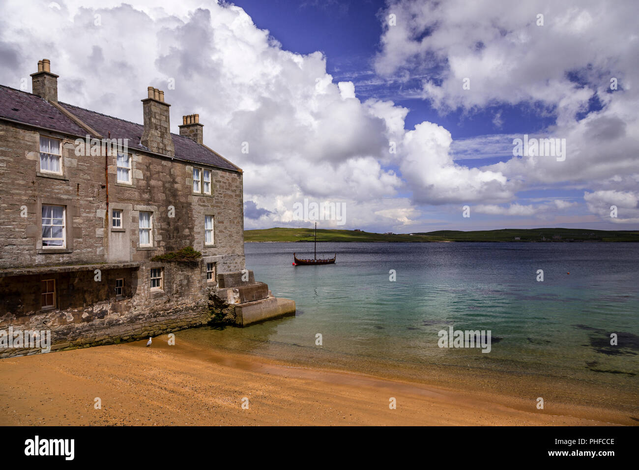 Old stone house by the sea at Lerwick, Shetland Isles, Scotland on a