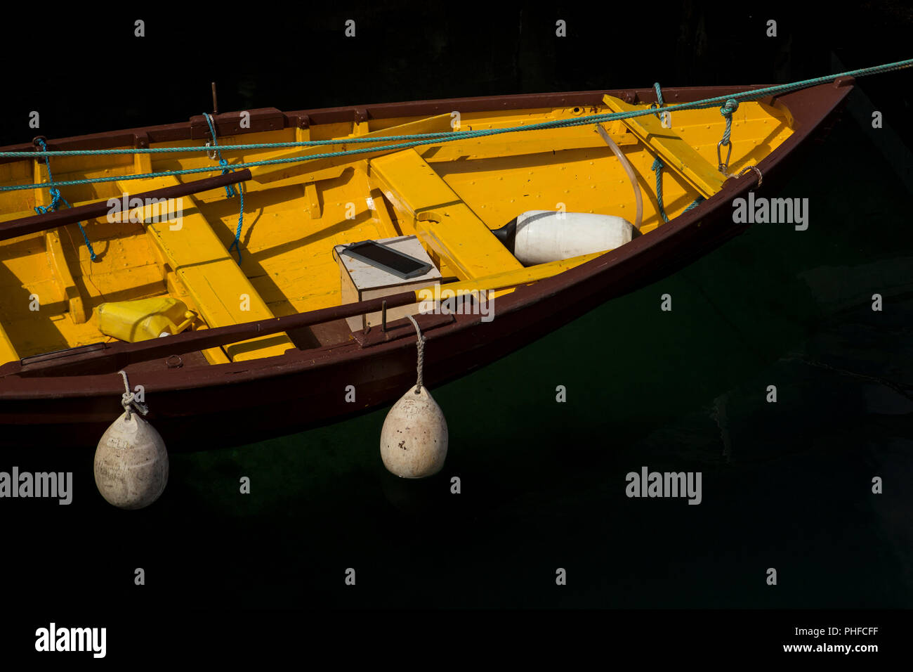 Yellow rowing boat at Lerwick harbour, Shetland Islands, Scotland Stock Photo